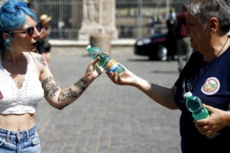 Italy and Spain scorched by heatwaves as cities issue red alerts