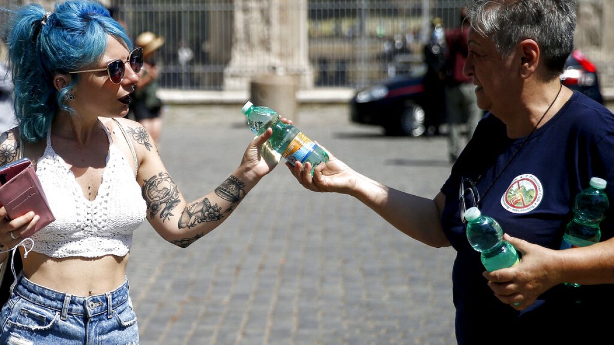 Italy and Spain scorched by heatwaves as cities issue red alerts