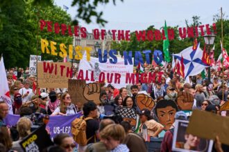 Hundreds take to the street in the Hague to demonstrate against NATO