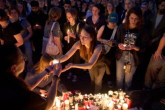 Graz residents hold mass, vigil to mourn victims of deadly shooting