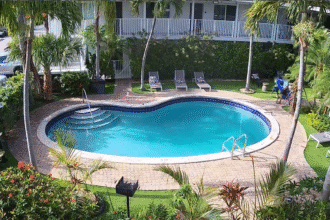 Surveillance video captures moment heroic stranger saves 6-year-old Florida boy sinking to bottom of pool