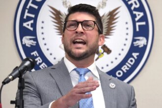 Florida attorney general held in contempt after challenging court’s block on immigration law