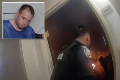 Heroic cop rushes into burning hotel room containing explosive devices to avert potential catastrophe: cops