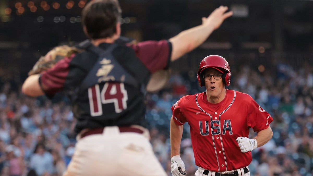 Rep. Randy Feenstra, R-Iowa, scores a run during the Congressional Baseball Game on June 11, 2025.