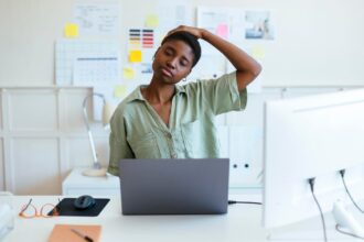 Looking Down While Reading This? Here’s How to Spot and Correct Tech Neck