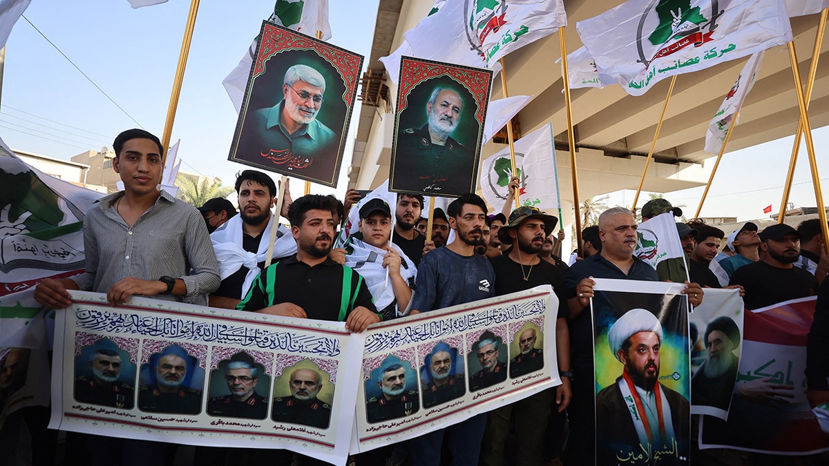 People gather during a pro-Iran protest