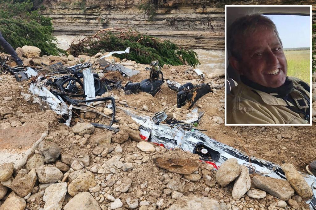 Volunteer Texas fire chief missing after he was swept away responding to rescue call — while cops helplessly watched on
