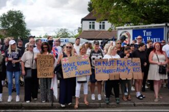 UK police arrest six after asylum seeker hotel protest turns violent