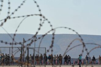 Hundreds of migrants moved to Greek mainland as Libyan arrivals surge