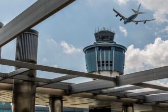 East Coast flyers face travel nightmare after weather sparks delays ahead of holiday weekend