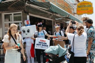 PETA distributes vegan wieners outside Nathan’s Hot Dog Eating Contest
