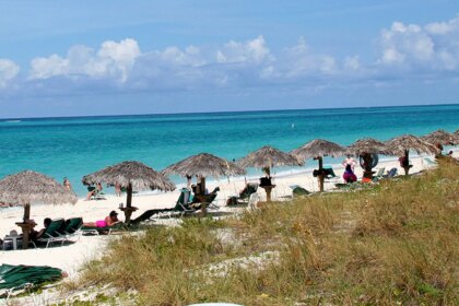 Mystery deepens as body discovered during search for missing American in island paradise
