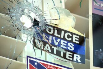 Blue city resident vows to keep pro-Trump political displays on home despite second shooting attack