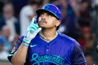 MLB trade deadline action gets underway as Mariners acquire first baseman Josh Naylor from Diamondbacks