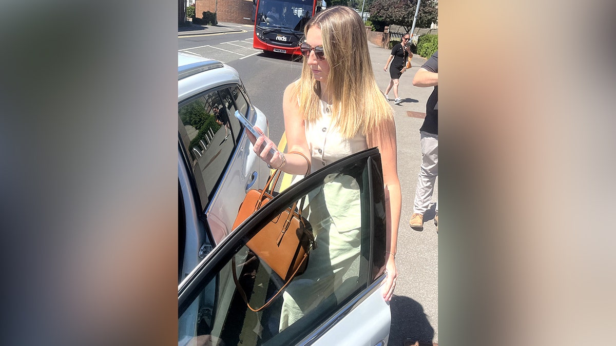 Former PE teacher Bronwen James, 29, leaves Salisbury Magistrates' Court, Wiltshire, Wednesday.