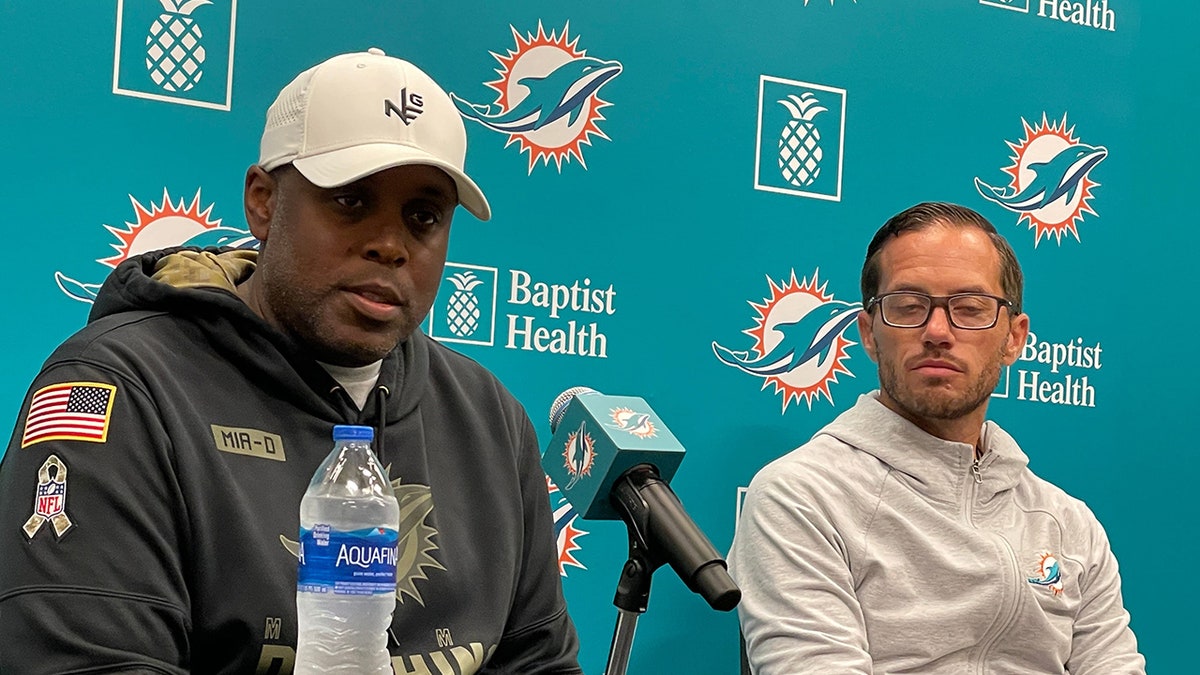 Chris Grier and coach Mike McDaniel of the Miami Dolphins