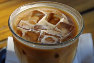 Should You Put Down the Iced Coffee During a Heat Advisory? This Is What Dietitians Say