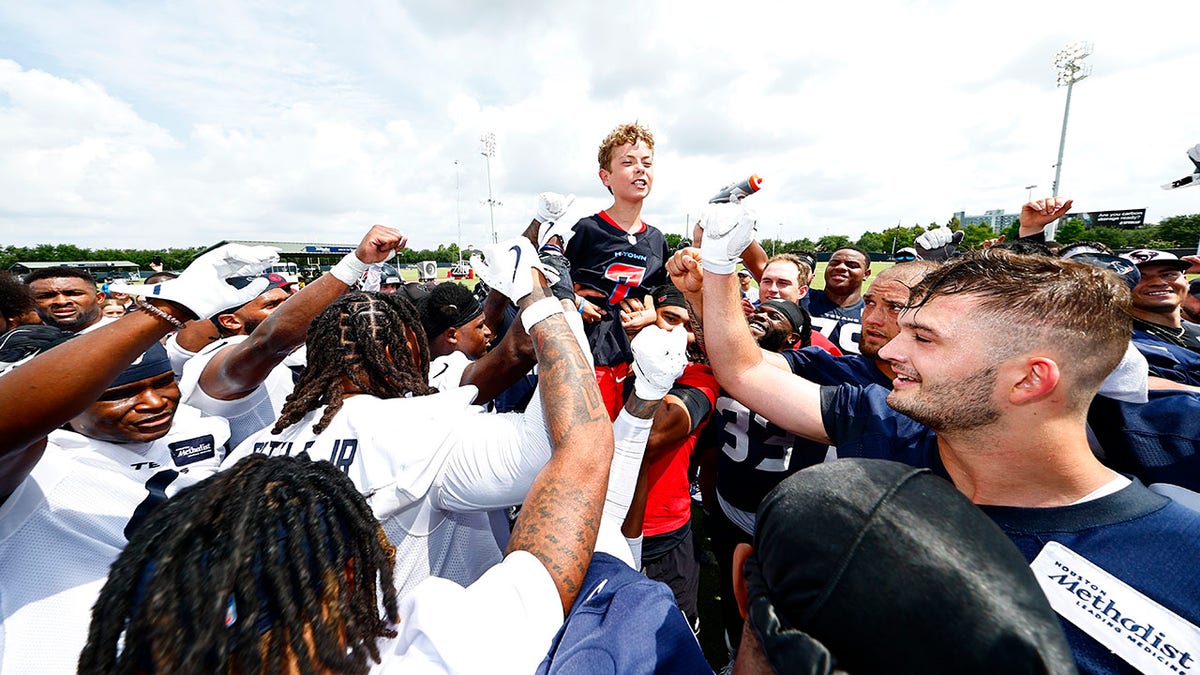Make-A-Wish recipient with Texans