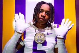 LSU football player accused of harboring 2 murder suspects in his dorm