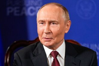 Putin appears to be visibly annoyed as reporters barrage him and Trump with questions