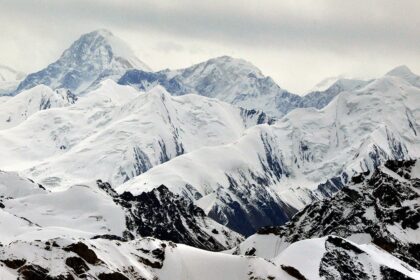 Rescue effort halted for stuck climber on treacherous mountain after climber dies trying to help her: reports