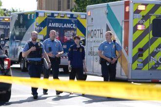 Minnesota hospital staffer joined shooting victim in CT scanner ‘so she didn’t have to go through it alone’