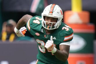 Miami football player Adarius Hayes surrenders to police on charges in fatal Florida crash
