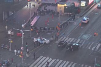 Three people shot after teen gunman opens fire in Times Square, sparking chaos in tourist hotspot