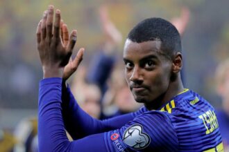 Liverpool breaks English transfer record with €145m signing of Isak