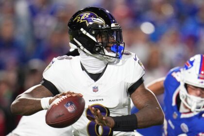 Ravens’ Lamar Jackson shoves fan after getting smacked in helmet following TD strike