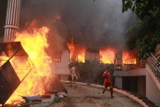 Nepal’s prime minister resigns as rioters burn leaders’ homes
