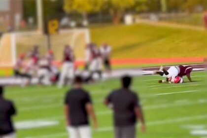 Michigan high school football player injured in vicious body slam returns to field in wheelchair