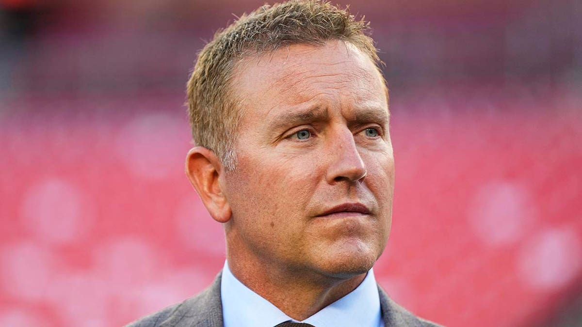 Kirk Herbstreit looks before a football game