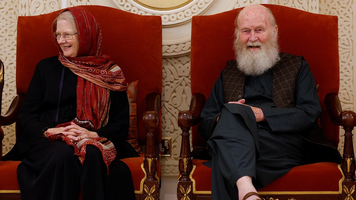 Couple talking to reporters in Qatar