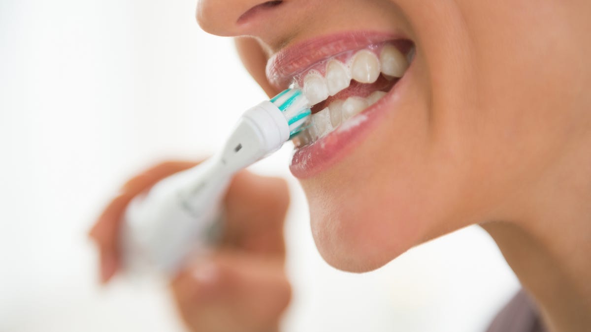 Sorry, but You’re Probably Using Your Electric Toothbrush Wrong. Here’s How to Do It Right