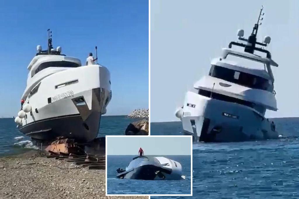 Brand new M luxury yacht tips over and sinks just minutes after launching — forcing crew to jump overboard