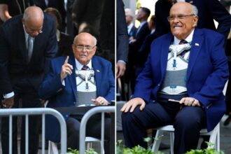 Rudy Giuliani arrives at Ground Zero for 9/11 memorial ceremony in wheelchair and body brace