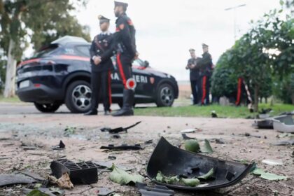 Italy’s PM offers solidarity with reporter after bomb targets his car