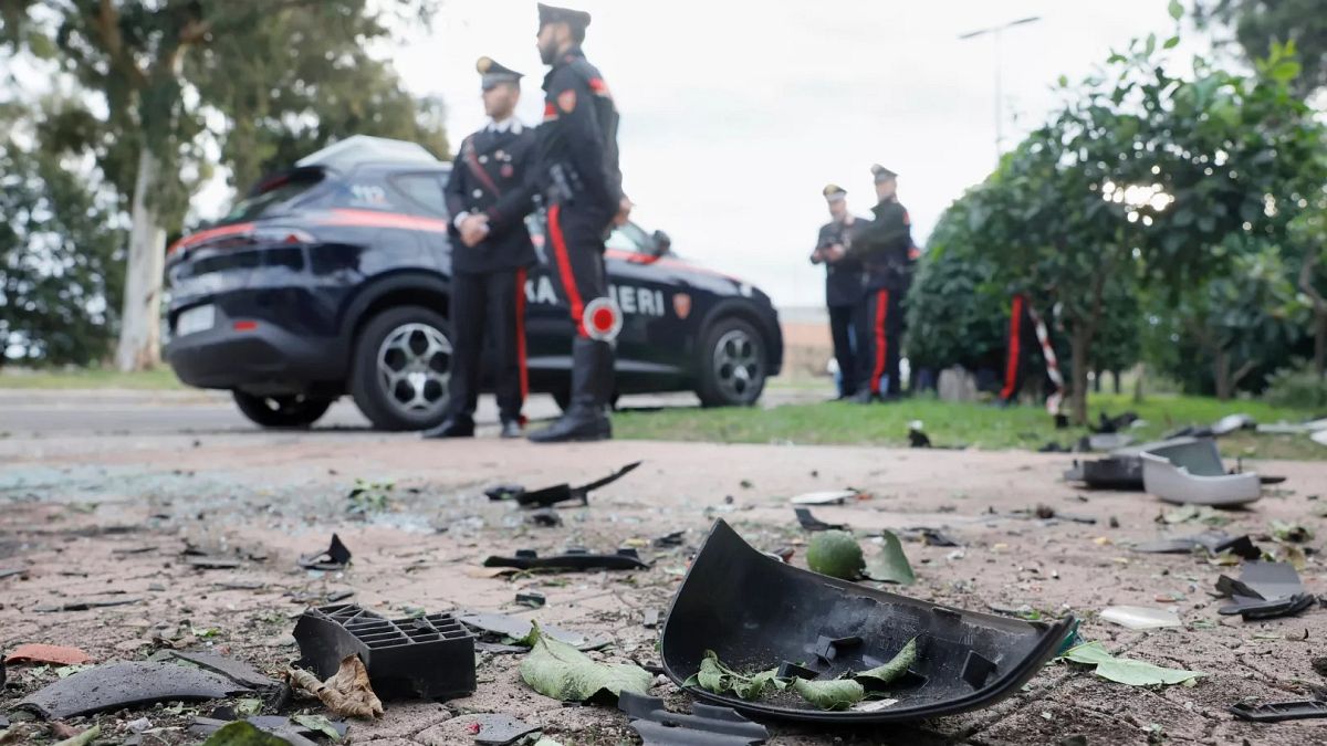 Italy’s PM offers solidarity with reporter after bomb targets his car