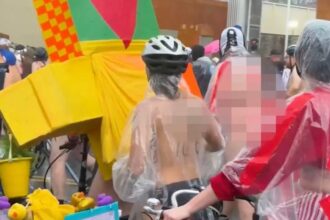 Bare-bottomed bikers roll through rain to shout at feds in blue city’s latest anti-ICE stunt