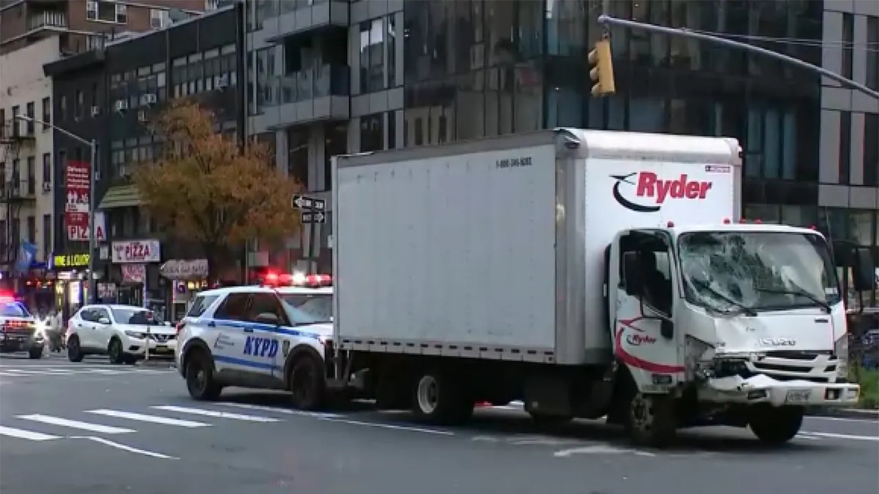 Truck hits parked van in Midtown Manhattan, pushing vehicle onto sidewalk and injuring 9 Truck hits parked van in Midtown Manhattan, pushing vehicle onto sidewalk and injuring 9