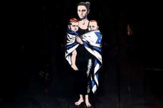 Hamas victim memorial featuring Shiri Bibas and sons targeted by vandals in Milan, Italy