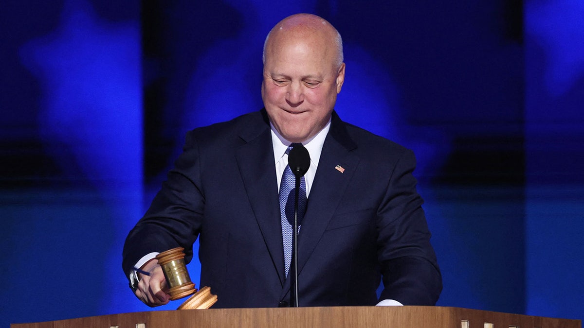 Mitch Landrieu appears on stage on Day 2 of the Democratic National Convention