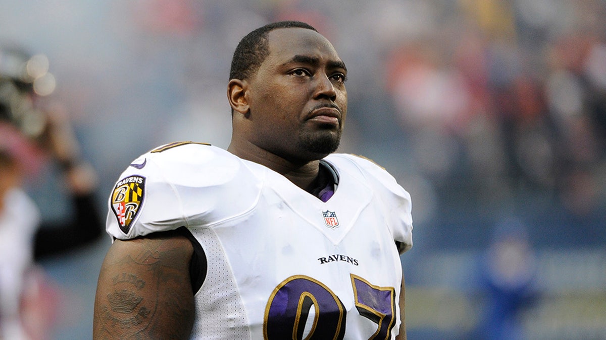 Arthur Jones warms up before a game