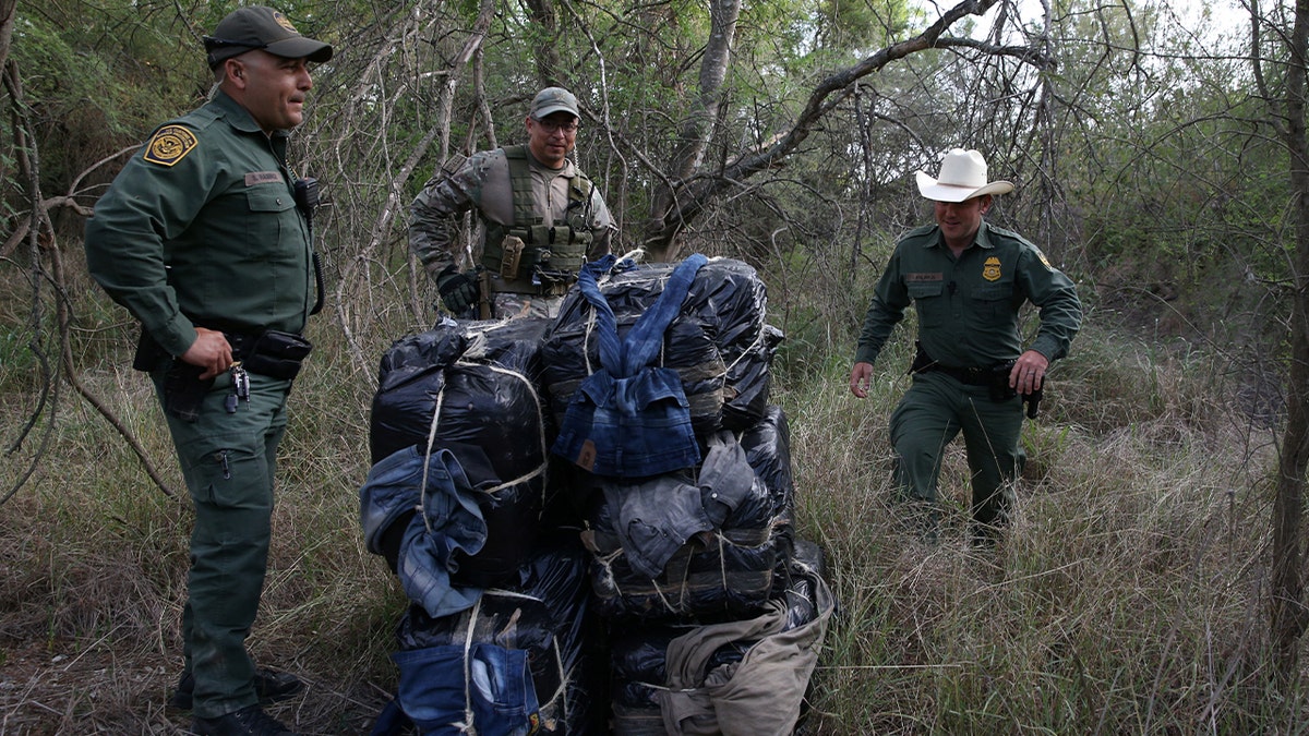 Border patrol agents and a special operations group member from the Texas Ranger Division