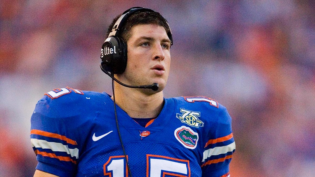 Tim Tebow with a headset on