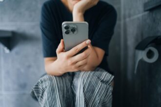 Study Reveals Doomscrolling While Using the Bathroom Has a Hidden Risk