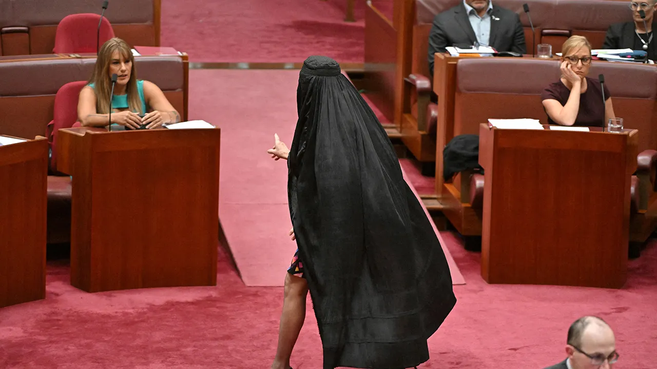 Australian senator wears burqa after move to block her face-covering ban bill