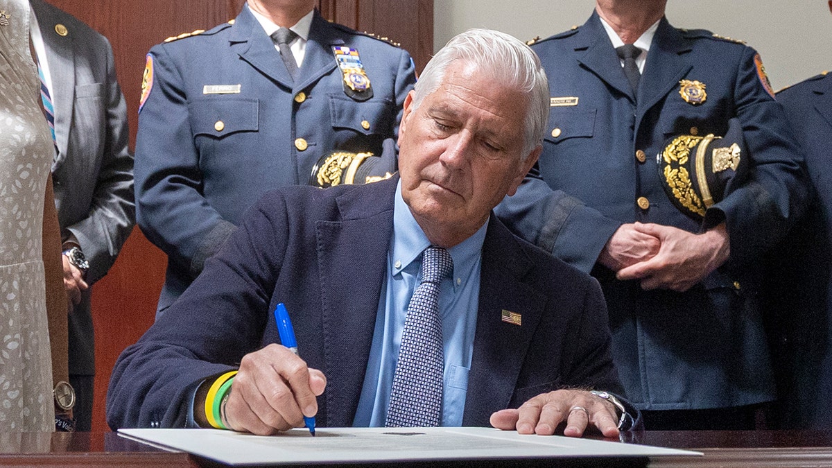 Bruce Blakeman signing bill