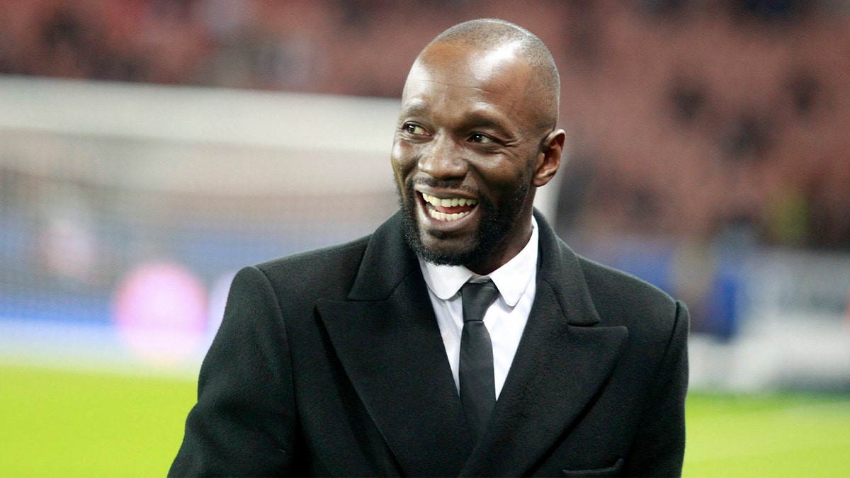 Claude Makelele watches the UEFA Champions League match in Paris.
